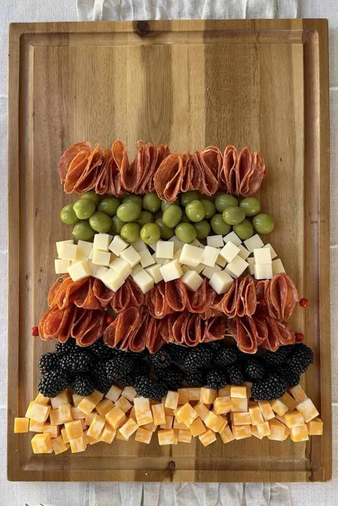 Charcuterie Tree Step 3 olives salami