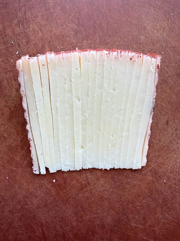 Trader Joe's Manchego cutting 3